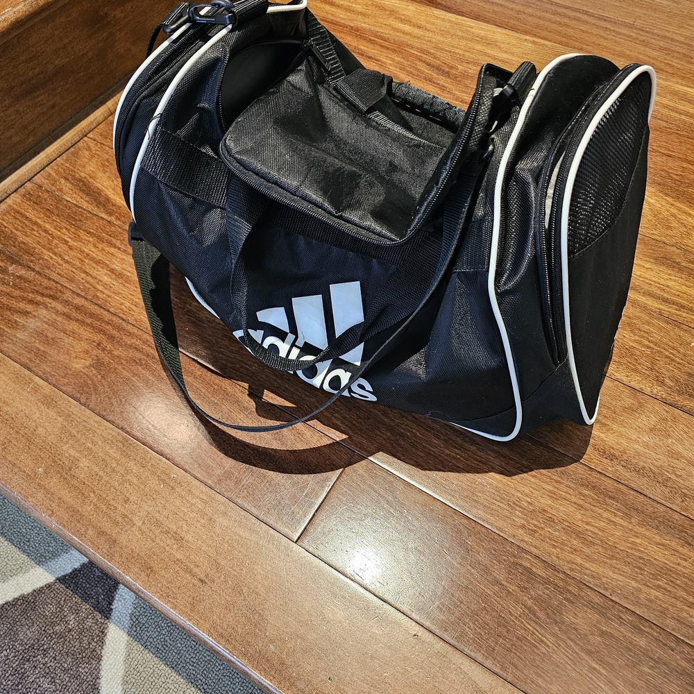 Adidas Black and White Duffel Bag with Sporty Design